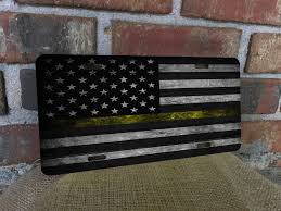 The american flag and blue line have often been blended with the image of a skull associated with the punisher comic book hero. Dispatchers License Plateusalicense Plateflaglicense Etsy Wooden American Flag License Plate License Plate Covers