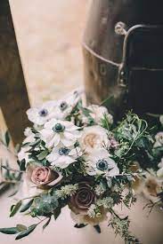 What shape should the bouquet be? Rue De Seine Bride With Flower Crown For Magical Tipi Wedding In Wiltshire With Images By Story Colour Photography Flower Crown Bride Tipi Wedding Anemone Bouquet Wedding