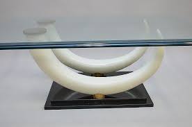 Wooden elephant statue hand carved with tusks solid heavy wood,animal, animal figurine, table top, home decor, perfect gift height 8 inches. Sold Price A Faux Elephant Tusk Coffee Table Base With Brass Elements And A Stair Stepped Marble Base And Glass Top Attributed To Maison Jansen Italy November 3 0117 5 30 Pm Est