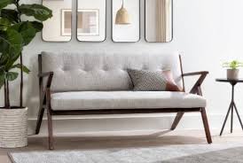 Look for darker finishes and. Mid Century Modern Living Room Style Tips Living Spaces