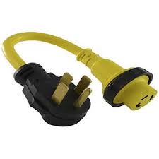 I purchased a a big, yellow adapter that is a 50 amp male with two 30 amp females. Conntek 14325 Rv 1 5 Foot Pigtail Adapter 50 Amp Rv Male Plug To 30 Amp Locking Female Connector
