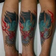 Here are some factors to ensure you get the best tattoo. Simple Multicolored Forearm Tattoo Of Asian Dragon Head Tattooimages Biz