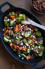 Topped With Pecans Cheese And Balsamic Vinegar The Roasted Root S One Dish Wonder Of Roasted Brussel Sprout Sprouting Sweet Potatoes Roasted Brussel Recipes