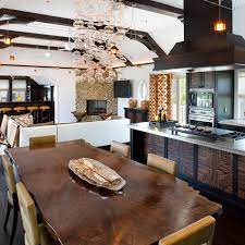 The gas stove or any induction cooker when place on kitchen island in center can be easily accessed by everyone from all the sides. Photos Hgtv
