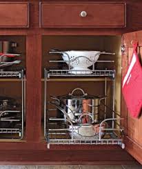 You can be as strategic about it as you like, but somehow the tool you end up needing always seems to be at the bottom of the pile—the corresponding lid nowhere to be found. 15 Creative Ideas To Organize Pots And Pans Storage On Your Kitchen Shelterness