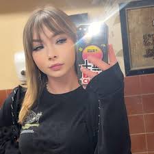 Named Chris P. Bacon by the sheriff's office, the pig has black fur and  white tusks.