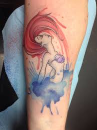The use of depth in the tattoo brings it to life as well and makes it appear as if ursula is extended off of their arm. 50 Amazing Little Mermaid Tattoos