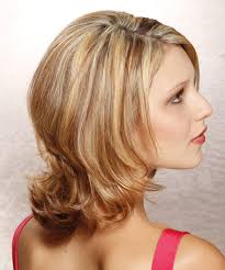 This fall, 90s hair is set to take the spotlight! Medium Straight Dark Golden Blonde Hairstyle With Light Blonde Highlights
