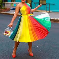 This long african print dress style with side slit, an asymmetric shoulder wedding guests are making superb statements in their ultra fabulous fashion ensembles. Mid Calf Oblique Collar Cap Sleeve Expansion Pleated Dress Runway Attractions