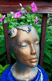 Upcycled enamel pot into a ghost decoration