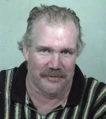 Police: 2 charged in cold-case murders