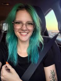 Who has colored hair in the group?