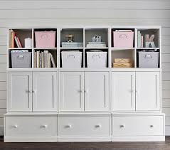 We may have had the biggest snowstorm of the year this week, but that hasn't stopped me. Build Your Own Cameron Wall System Playroom Storage Pottery Barn Kids