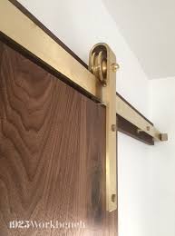 This gorgeous barn door style is full of mismatched wood planks and a chevron pattern. Introducing Our Newest Barn Door Hardware Solid Brass This One Here Is On The Soli Interior Barn Door Hardware Door Handles Interior Sliding Barn Door Track