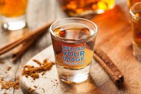 Download Placeit Shot Glass Mockup Featuring Cinnamon Sticks