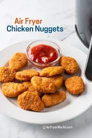 Flip, and cook for 3 more minutes, or until cooked through and 165°f or no longer pink in the middle. Air Fried Frozen Chicken Nuggets Easy And Crispy Air Fryer World