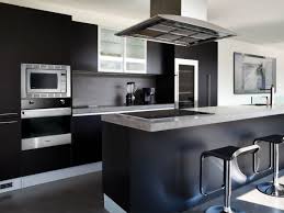 Matte black hardware defines the white cabinetry and multiple faucets while the polished nickel pendants dress the floating space without demanding recognition. Black White Kitchens Modern Decorkeun