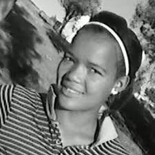 Life sentence for woman who beheaded pensioner