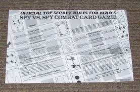 The objective of kings corner is to get rid of all your cards into eight piles in a solitaire fashion.the game starts with four piles, four more may be added during play to the corners. Spy Vs Spy Combat Card Game Board Game Boardgamegeek