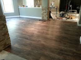 Vinyl Snap Together Floating Floor Looks Just Like Real Hardwood Basement Makeover Floating Floor Concrete Stained Floors