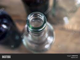 Within multifocal glasses there are bifocals, which have an extra segment with a closer focus slapped on top of a distance single vision lens, giving a so, more recently, progressive lenses have been created. Top Down View Glass Image Photo Free Trial Bigstock