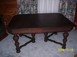 It is a dark finish,counter height table w/ ladder back chairs & a buffet & hutch. 40 Antique Dining Room Tables Ideas