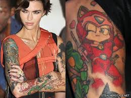 Ruby rose knuckle tattoos look good when they are inked small but can also be large in size to make it more visible when worn. Ruby Rose S 48 Tattoos Meanings Steal Her Style