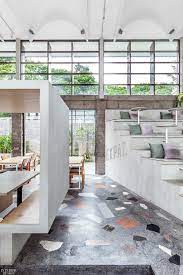 X O Blends Laid Back Lush With Australian Gastronomy For The Full Circle Cafe In Bali Cafe Interior Design Cafe Interior Modern Interior Design