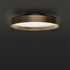Lighting can make or break the atmosphere in a space, and when done right, transform a space from a practical gathering spot to a stylish and functional space for entertaining. Wall Ceiling Lamps Archivi Oluce