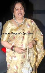 The filmmaker looked dashing in his bright yellow bomber jacket and ripped jeans. 11 Kiran Kher Jewellery Ideas Kirron Kher Saree Elegant Saree