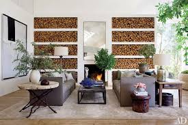 Amazing gallery of interior design and decorating ideas of multiple coffee tables in living rooms, decks/patios, pools by elite interior designers. Stylish Celebrity Coffee Tables From Patrick Dempsey Chrissy Teigen And Naomi Watts Architectural Digest