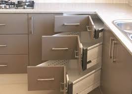 Diagonal cabinets are a common solution to the kitchen corner problem. The Good And Bad Of Kitchen Accessories Corner Drawers Home Built In Storage