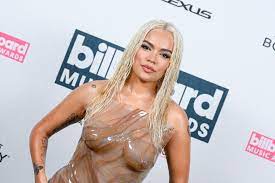Karol G Wears Trendy Wet Look at Billboard Music Awards 2023 – WWD