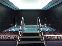 The spa's zen theme features bamboo walls, soft lighting and wooden walkways over rippling water and pebble stones leading to seven treatment rooms. Dl8sl4f3tcmudm
