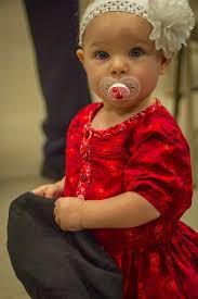 Madeline Rombach protects her mom Sgt. Jessica Rombach's