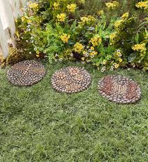 Pry away the surrounding turf on the garden stepping stone. Resin Rock Garden Stones Set Of 3 Plowhearth
