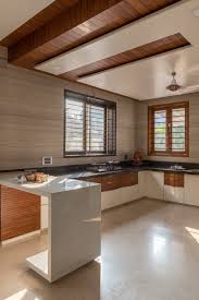 The Contemporary Cubic House Tvakshati Architects It S A Contemporary Cubic House Design Kitchen Room Design Kitchen Furniture Design Interior Design Kitchen