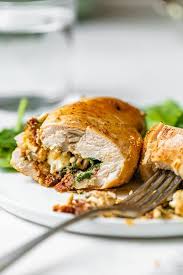 Spinach Stuffed Chicken Breasts With Tomato And Feta Recipe In 2021 Poultry Recipes Skinny Taste Recipes Spinach Stuffed Chicken