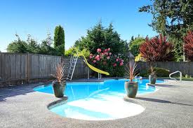 Muriatic acid and water solution with a stiff bristled broom. Exposed Aggregate Pool Deck Pros And Cons Designing Idea