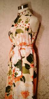 The knee length or mid length dress is perfect for evenings out, or a great alternative to a suit in the office. Sold 1960s 70s Vintage Herbert Laurence Bold Floral Print Maxi Gown Theredvelvetshoe Com Shop Luxury Designer Vintage Clothing