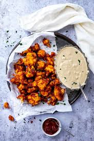 In a large bowl, mix the hot sauce and oil or butter. Smoky Bbq Cauliflower Wings Vegan Wfpb Ve Eat Cook Bake