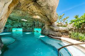 7 Hotel Pools You Ll Want To Travel To That Go Way Beyond Swim Up Bars Hotel Swimming Pool Hotel Pool Resort Pools