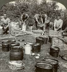 Army cooks preparing a meal, World War I, 1914-1918.
