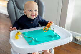The busy baby mat and tether system provides a clean, safe eating surface for infants and toddlers. Busy Baby Mat Busy Baby Mat The First Placemat To Keep Baby S Toys In Place