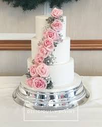 A Three Tier Traditional Wedding Cake With Flower Cascade Completed With Real Flowers I Wedding Cake Pink Flowers Pink And Grey Wedding Cake Pink Wedding Cake