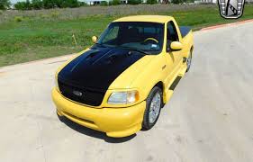 Image result for Federal Safety Yellow 2002 Truck