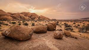 Namibia, formerly part of south africa, is a good place to start making your dream come true. Typical Round Stones In The Namibian Savanna At Sunset Stock Photo Picture And Royalty Free Image Image 55310069