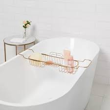 Many bath caddies go across the bathtub and provide a stable surface above the water where you can place your items. Best Bath Caddy Tray Real Women Reviews 2021