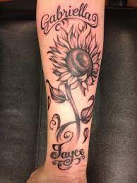 Pin By Tammie Piterski On All The Pretty Things Tattoos With Kids Names Sunflower Tattoo Sunflower Tattoo Shoulder