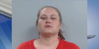 Woman charged in Lexington murder